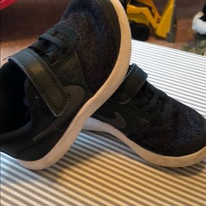 Black and white boys Nike sneakers